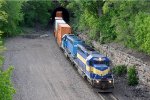 Eastbound intermodal transfer pops out of the tunnel